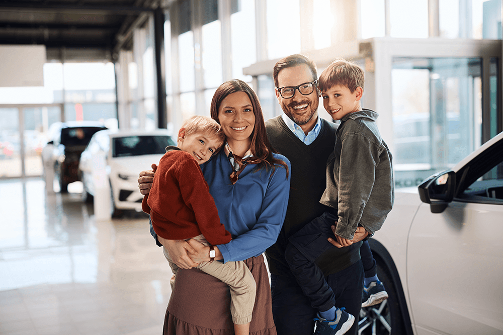portrait-of-happy-family-at-car-dealership-2026-03-27-01-35-48-utc.png