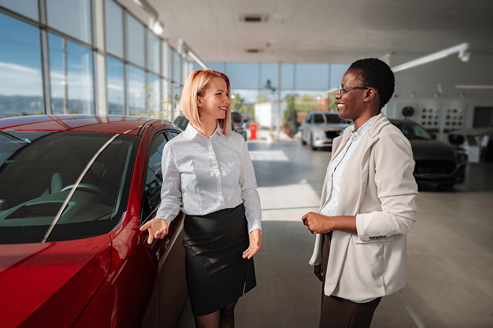 saleswoman-talking-with-customer-at-car-dealership-2026-01-11-10-51-09-utc.png
