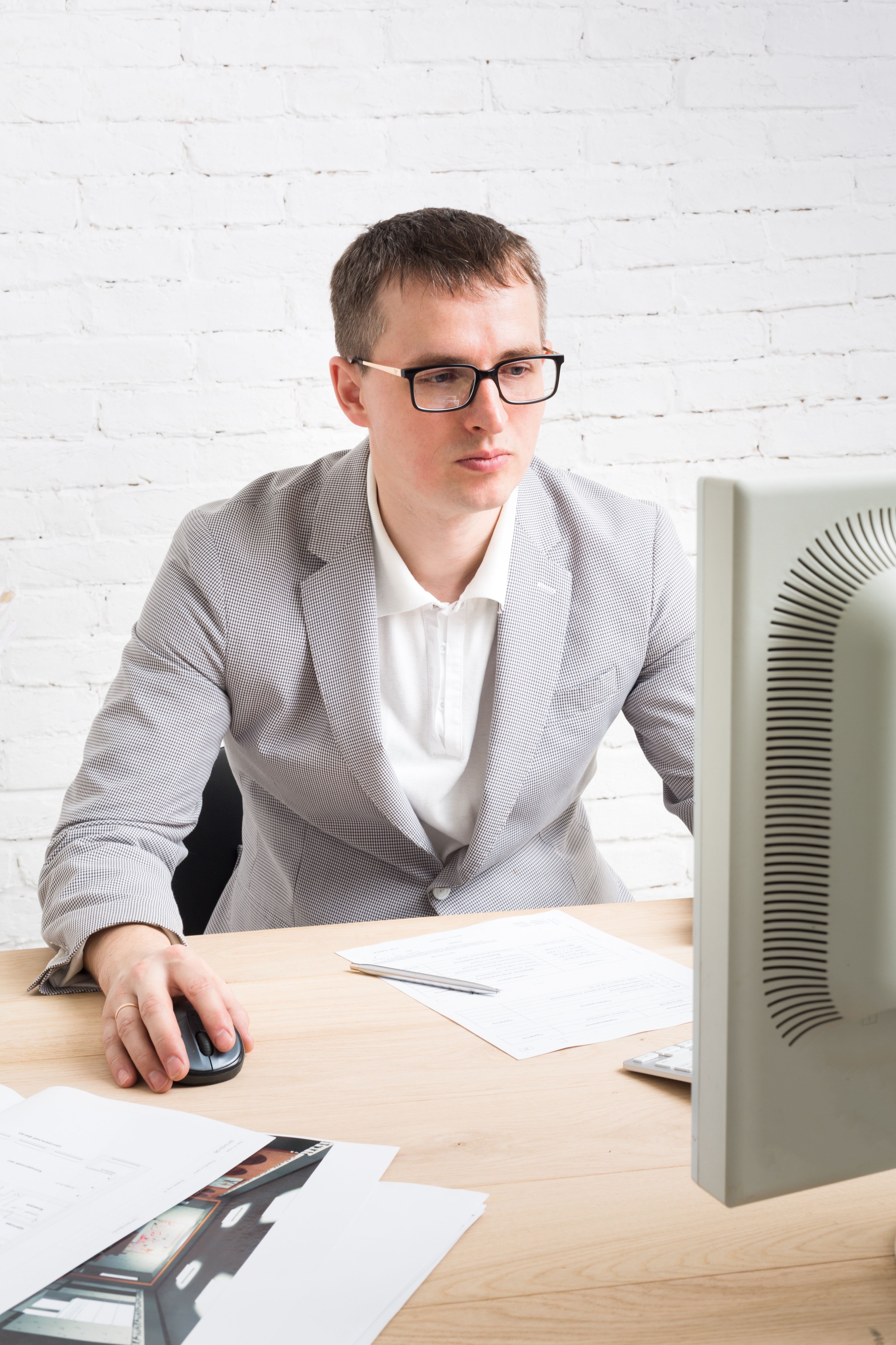 young-businessman-working-with-laptop-in-modern-wh-2026-04-13-00-37-51-utc.jpg